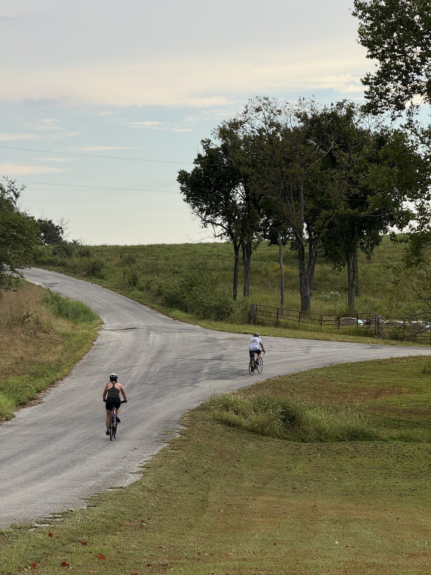 Country Miler 2026 — riders at a rural fork on open Polk County country roads